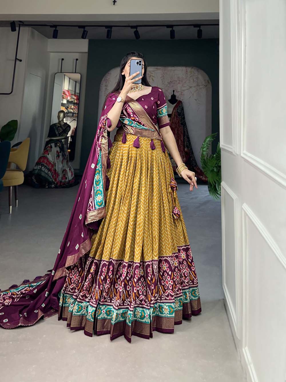 Impressive Tussar Silk Patola Printed Foil Worked Lehenga Choli