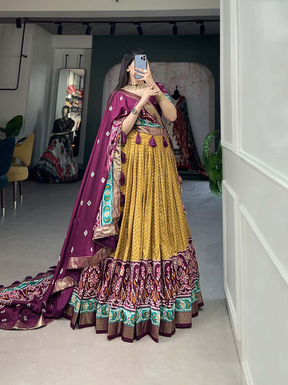 Impressive Tussar Silk Patola Printed Foil Worked Lehenga Choli