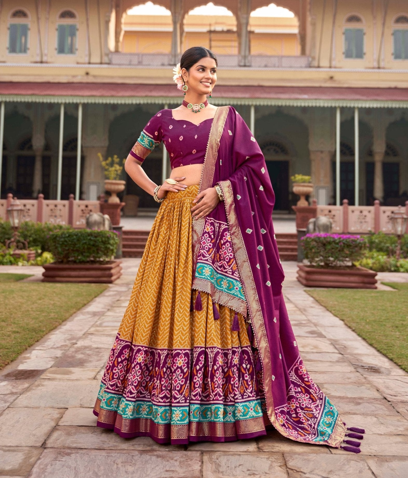 Impressive Tussar Silk Patola Printed Foil Worked Lehenga Choli