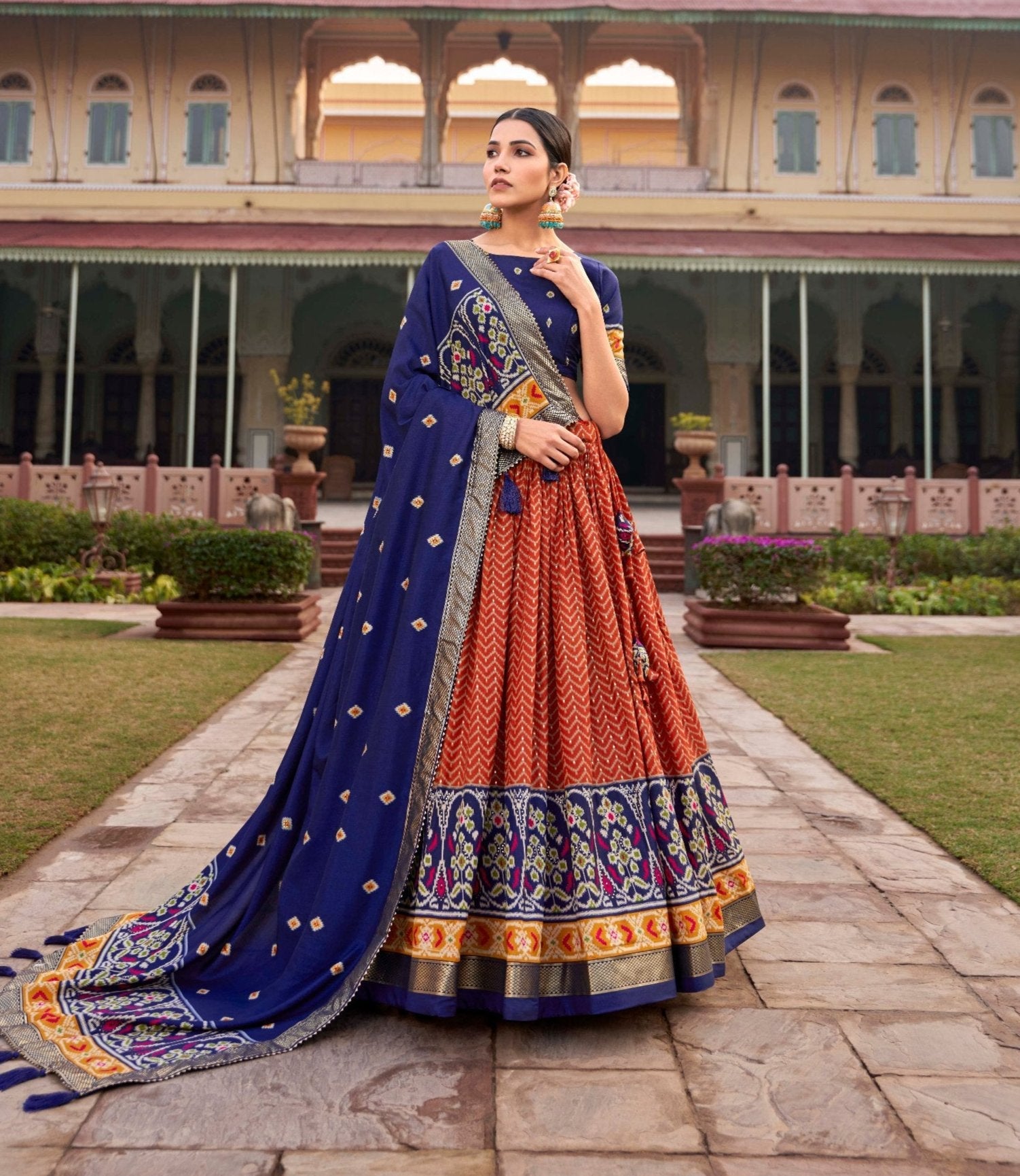 Incredible Orange Tussar Silk Patola Printed Lehenga Choli