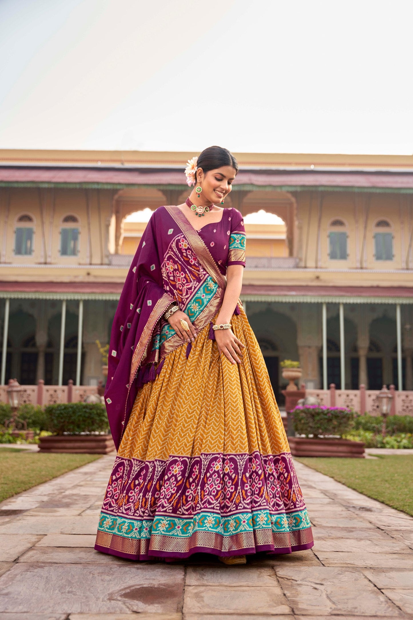 Impressive Tussar Silk Patola Printed Foil Worked Lehenga Choli