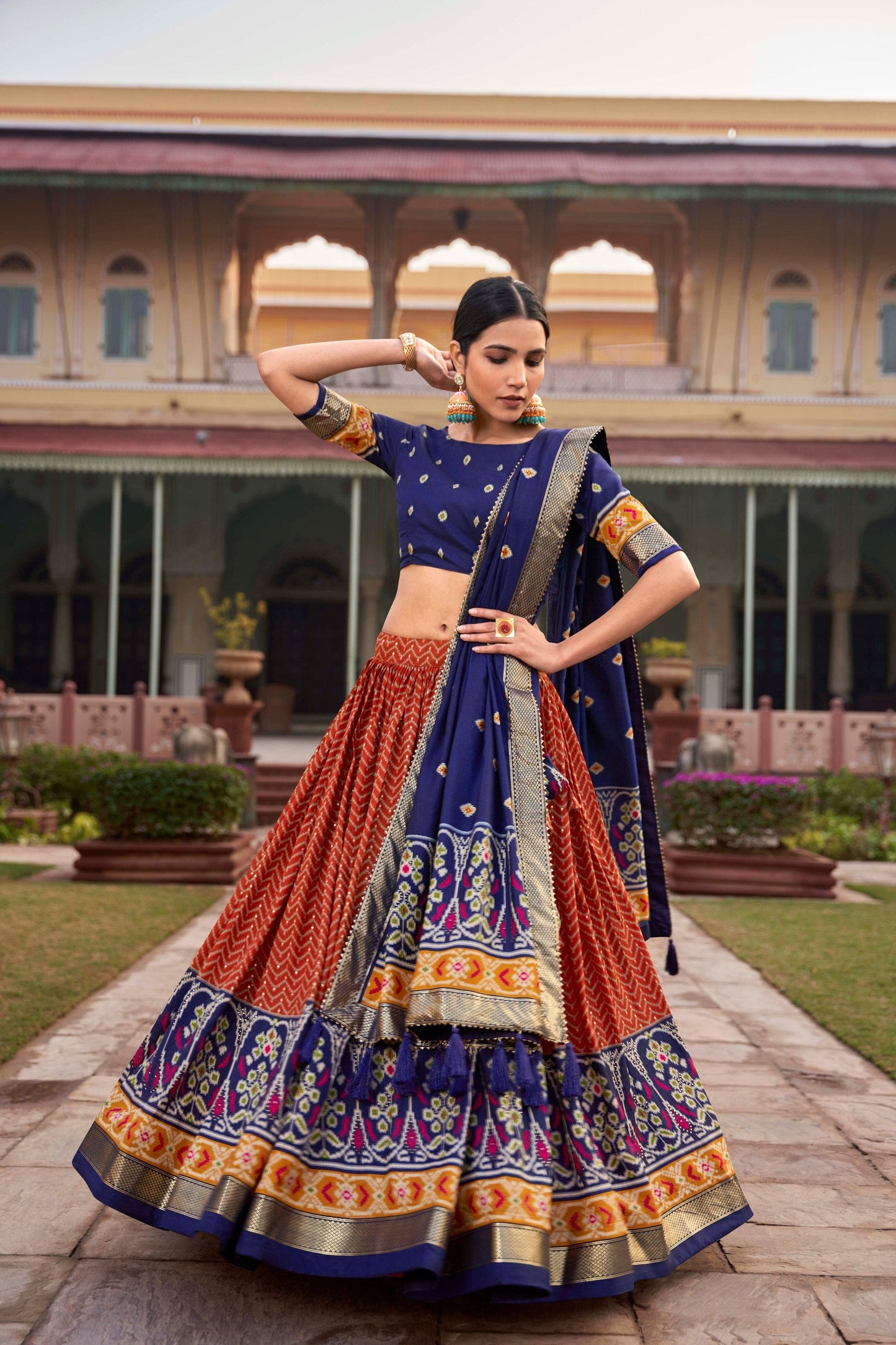 Incredible Orange Tussar Silk Patola Printed Lehenga Choli