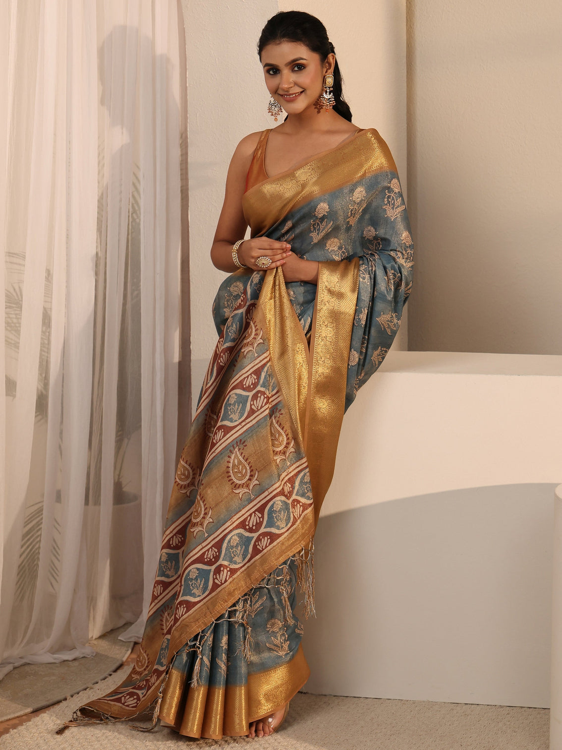 Mameraa Blue Floral Printed Silk Blend Tassel Saree with Woven Border