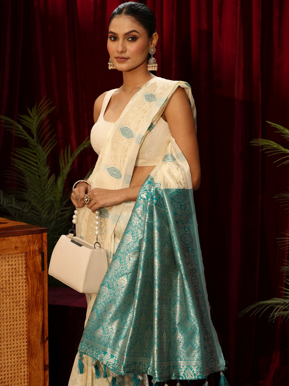Mameraa Cream Floral Woven Design Silk Blend Tassel Saree