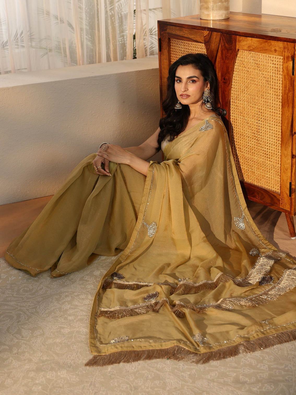 Mameraa Henna Green Tissue Saree with Tassel Embellished Pallu