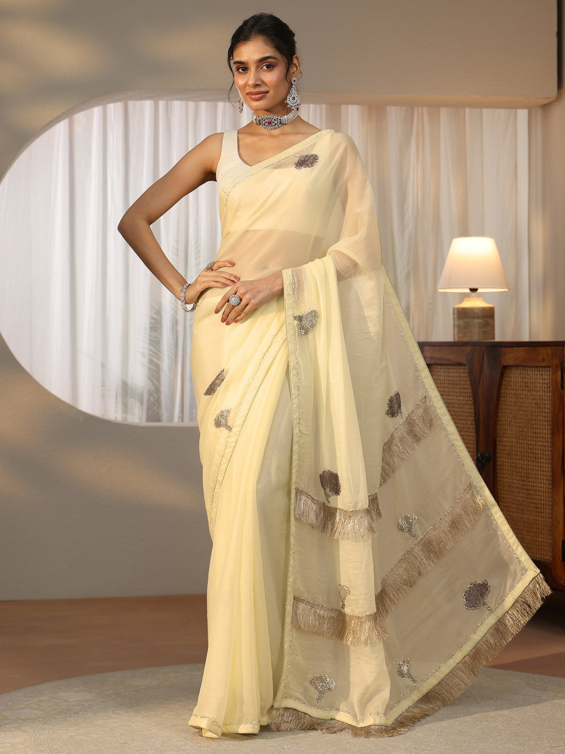 Mameraa Light Yellow Tissue Saree with Tassel Embellished Pallu