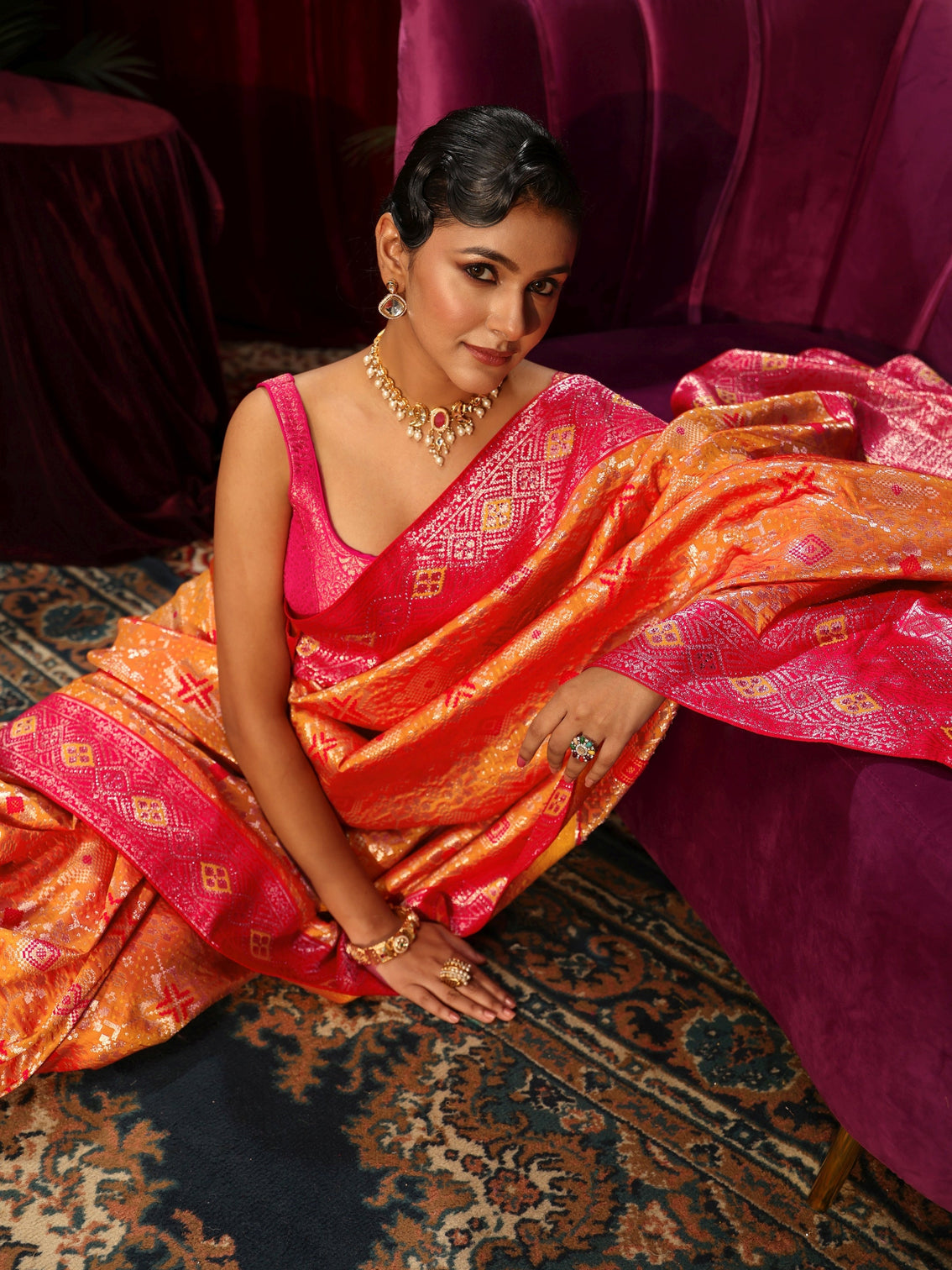 Mameraa Orange Woven Design Embellished Silk Blend Patola Saree