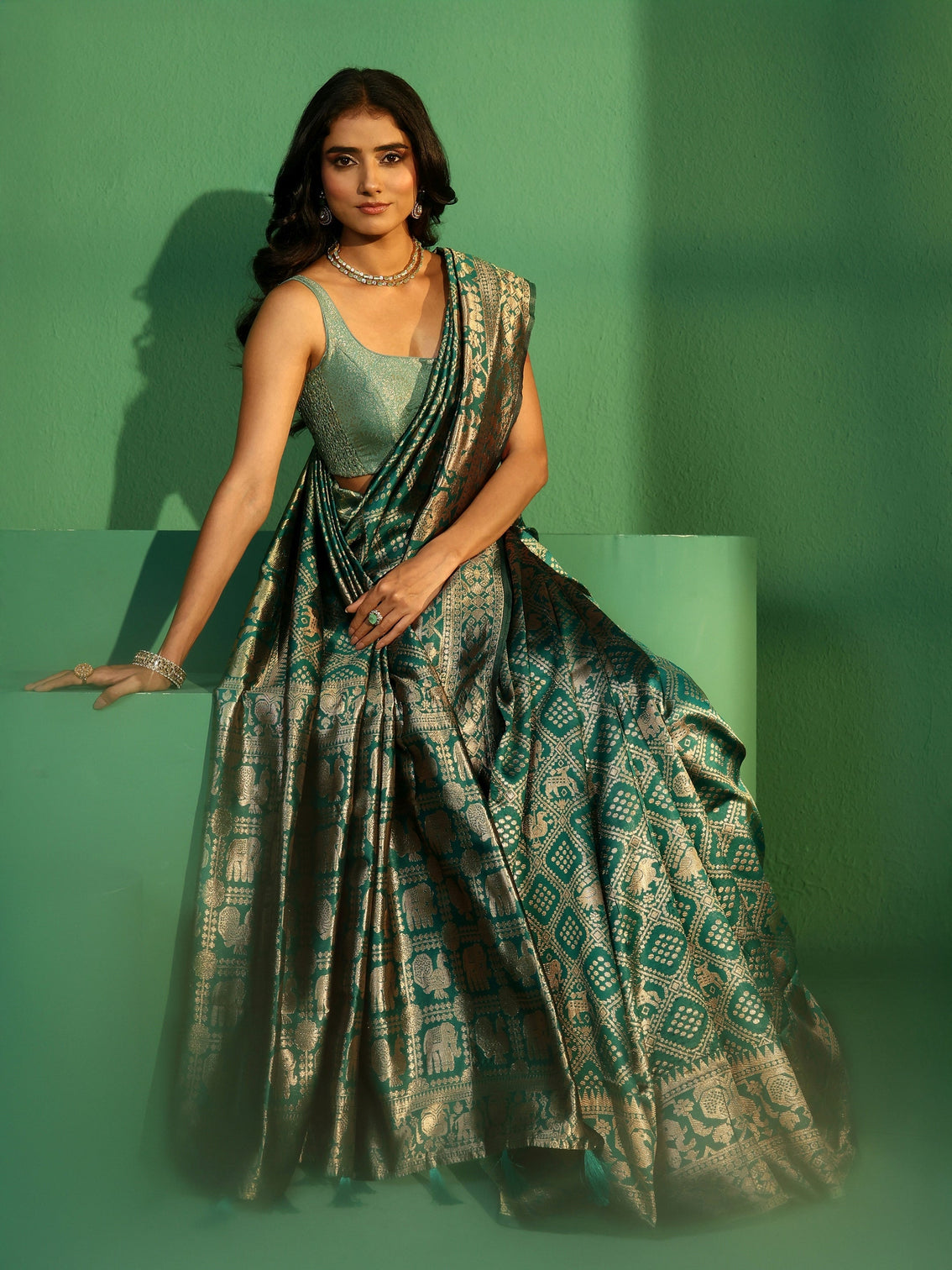 Mameraa Teal Green Brocade Saree with Elephant Motifs