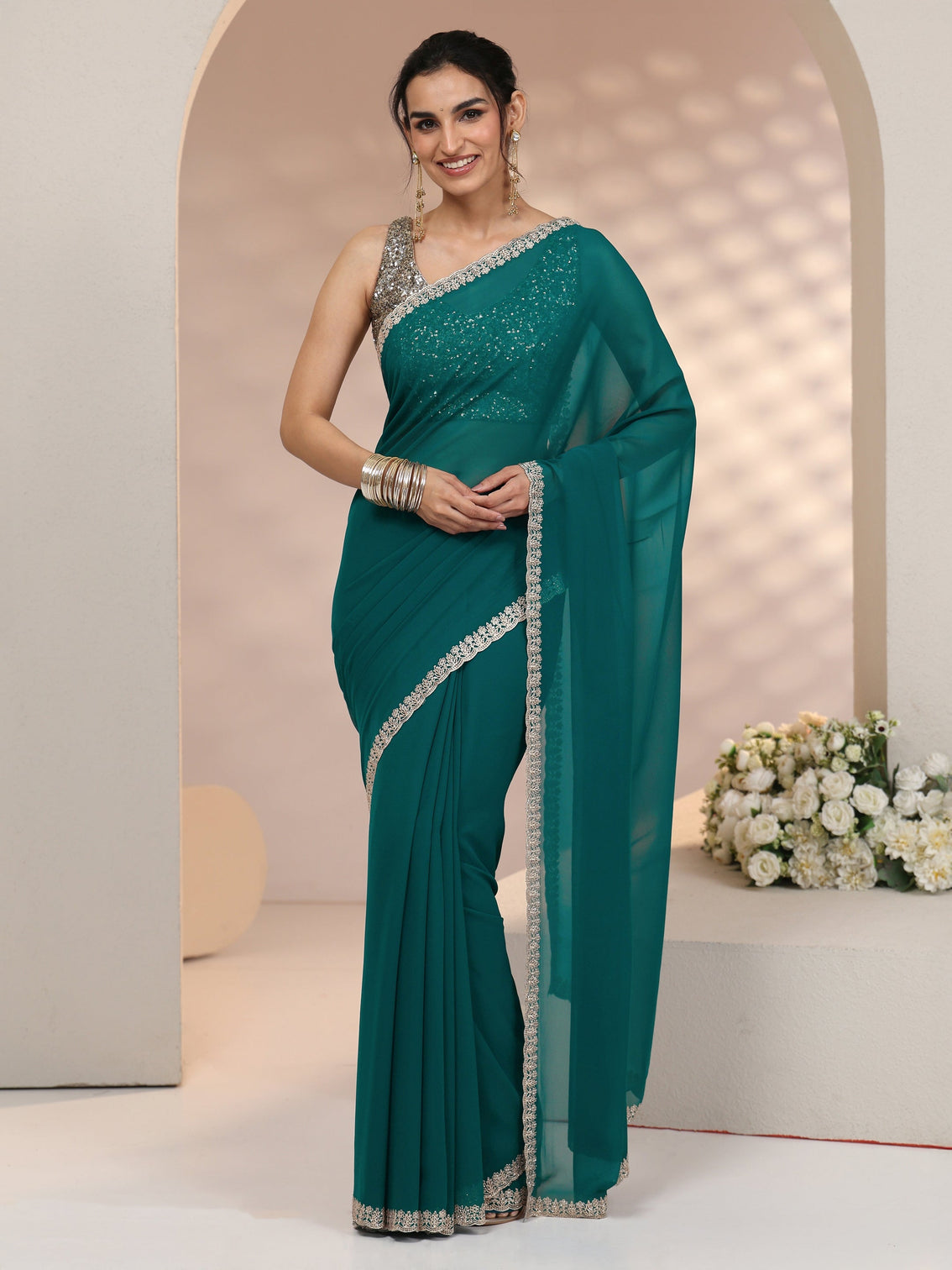 Mameraa Teal Green Georgette Saree with Embroidered Border
