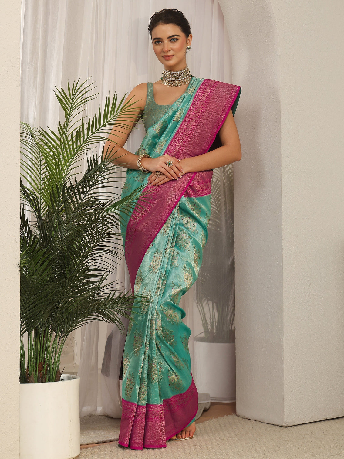 Mameraa Turquoise and Pink Floral Woven Design Silk Blend Saree - Mameraa