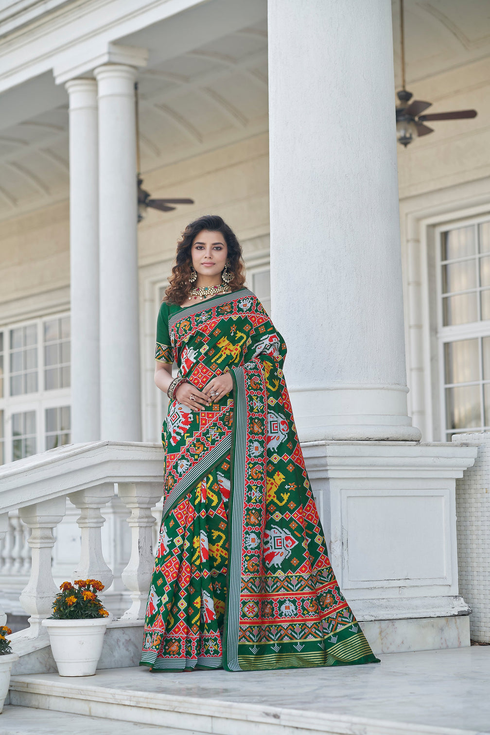 Lovable Green Weaving Patola Silk Wedding Wear Saree