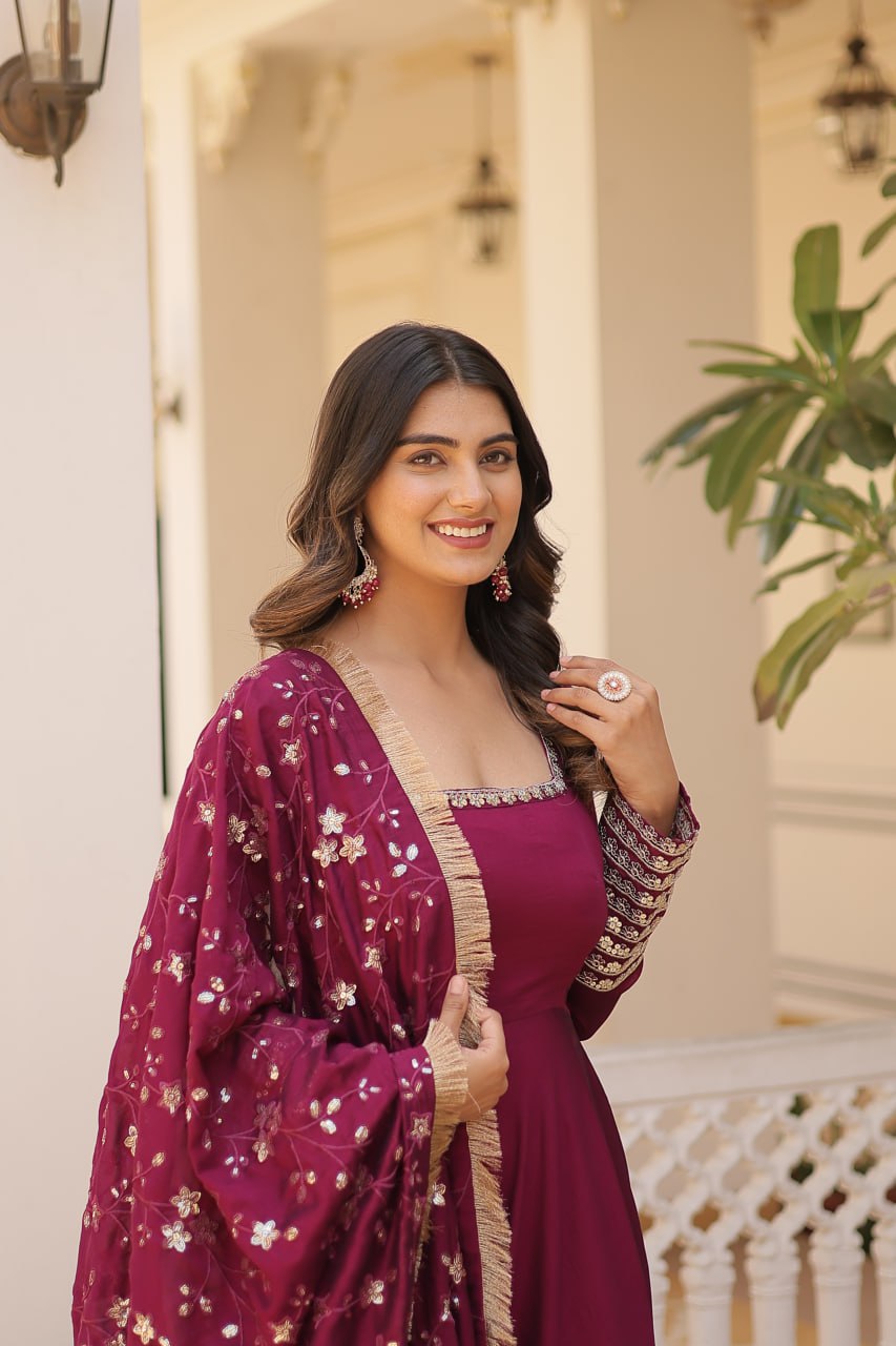 Embrace timeless elegance with our meticulously crafted Vichitra silk Magenta Pink gown and dupatta set.