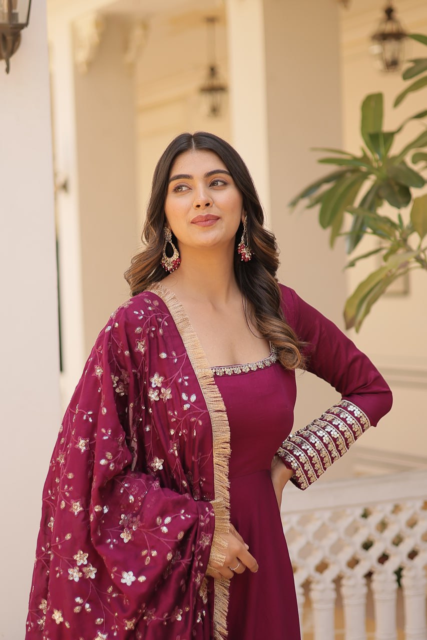 Embrace timeless elegance with our meticulously crafted Vichitra silk Magenta Pink gown and dupatta set.