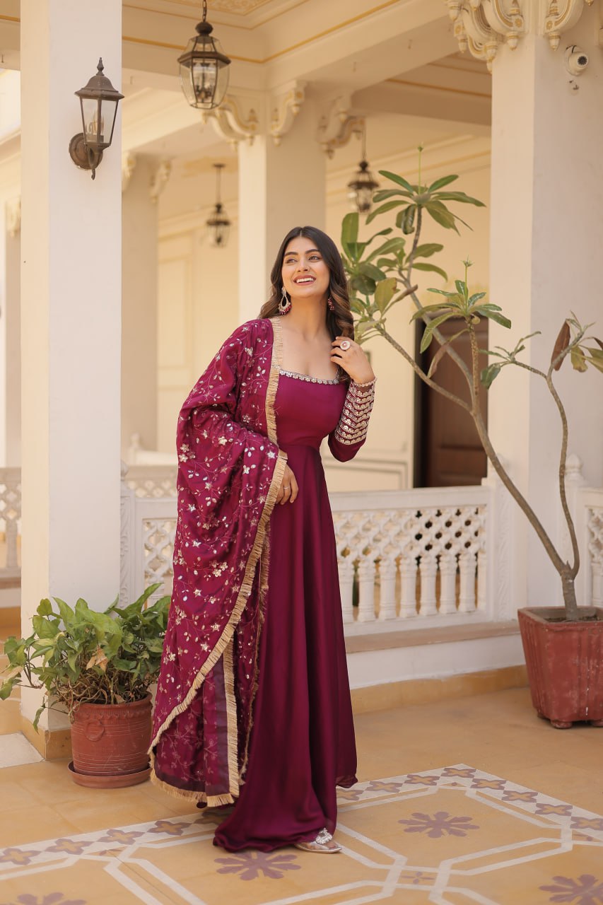 Embrace timeless elegance with our meticulously crafted Vichitra silk Magenta Pink gown and dupatta set.