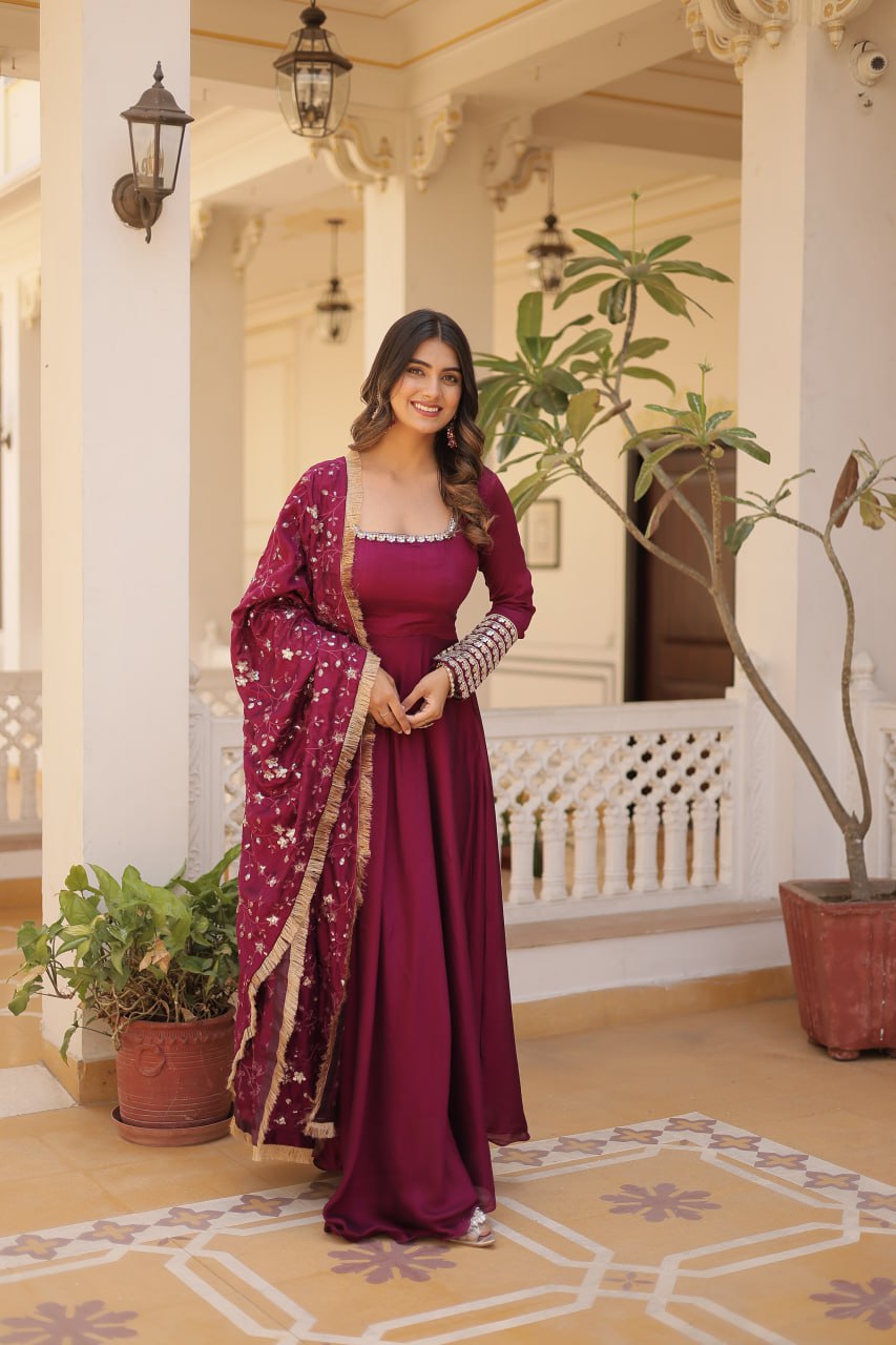 Embrace timeless elegance with our meticulously crafted Vichitra silk Magenta Pink gown and dupatta set.