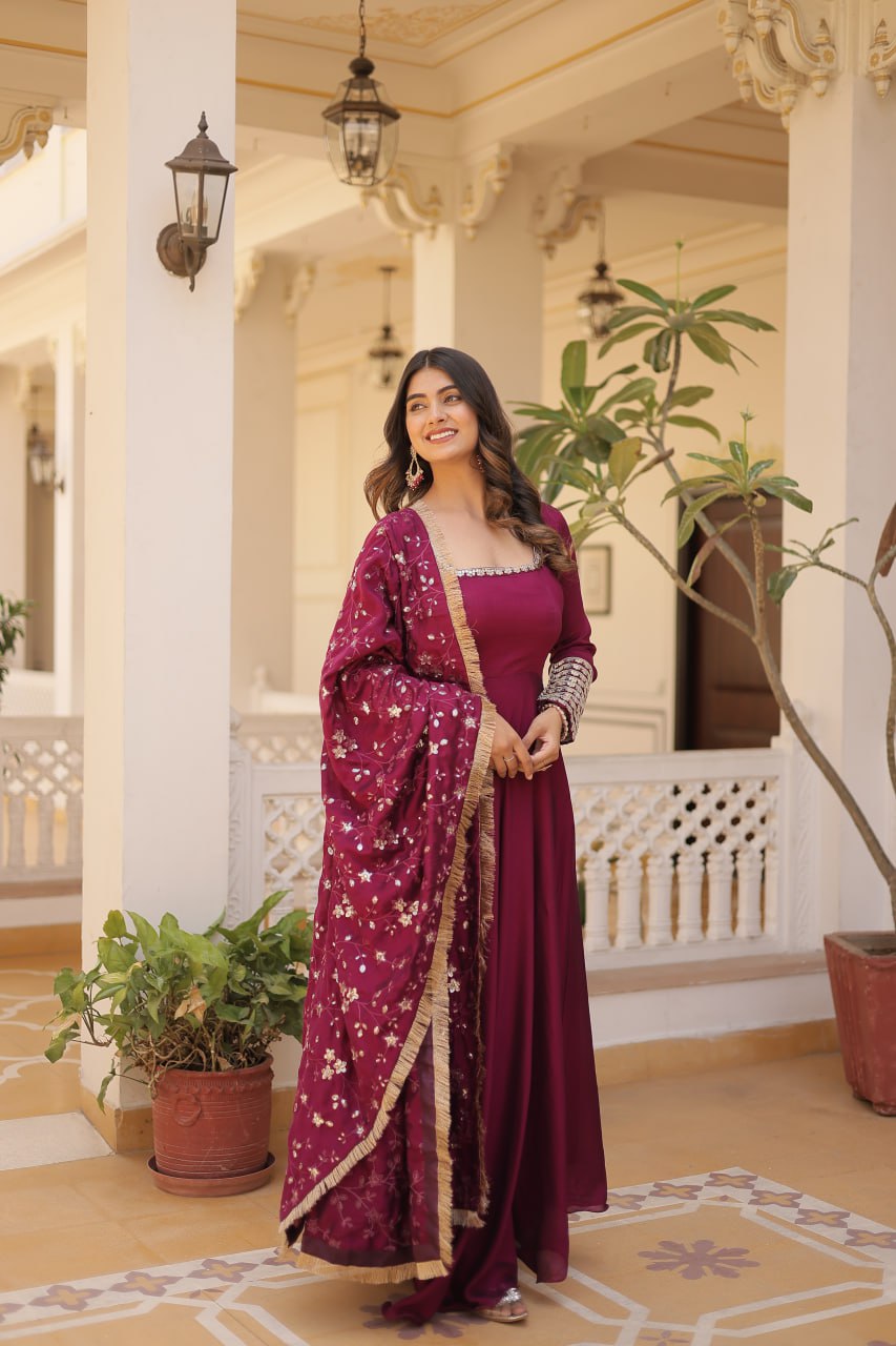 Embrace timeless elegance with our meticulously crafted Vichitra silk Magenta Pink gown and dupatta set.