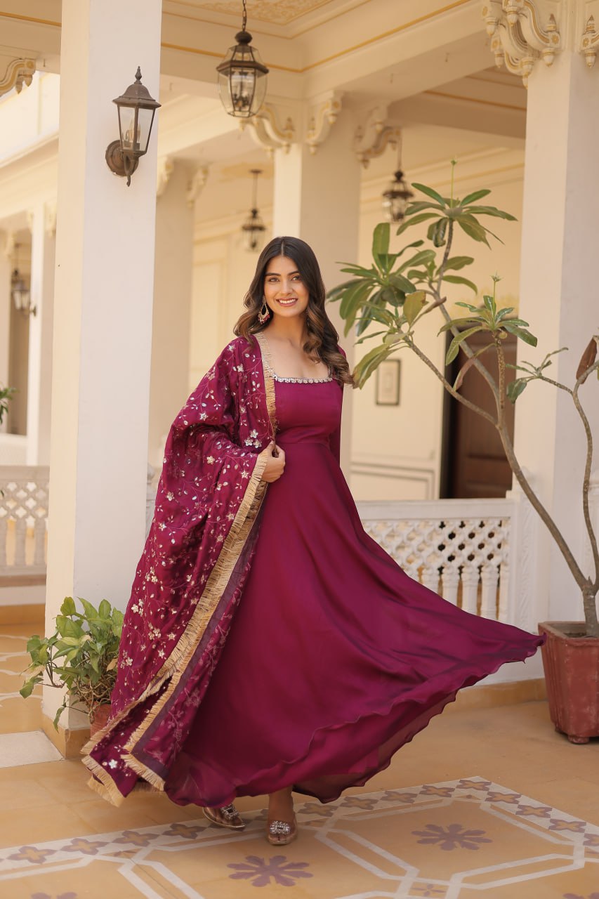 Embrace timeless elegance with our meticulously crafted Vichitra silk Magenta Pink gown and dupatta set.