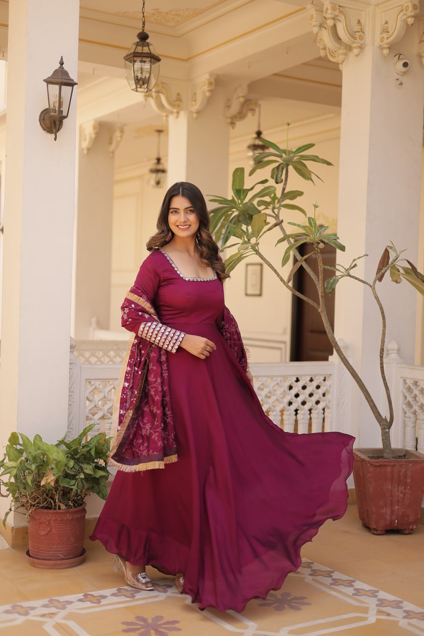 Embrace timeless elegance with our meticulously crafted Vichitra silk Magenta Pink gown and dupatta set.
