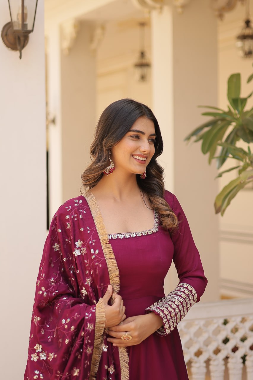 Embrace timeless elegance with our meticulously crafted Vichitra silk Magenta Pink gown and dupatta set.