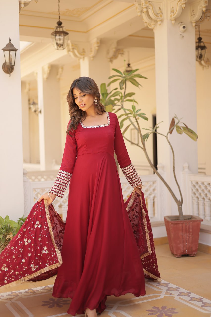 Embrace timeless elegance with our meticulously crafted Vichitra silk Maroon gown and dupatta set.