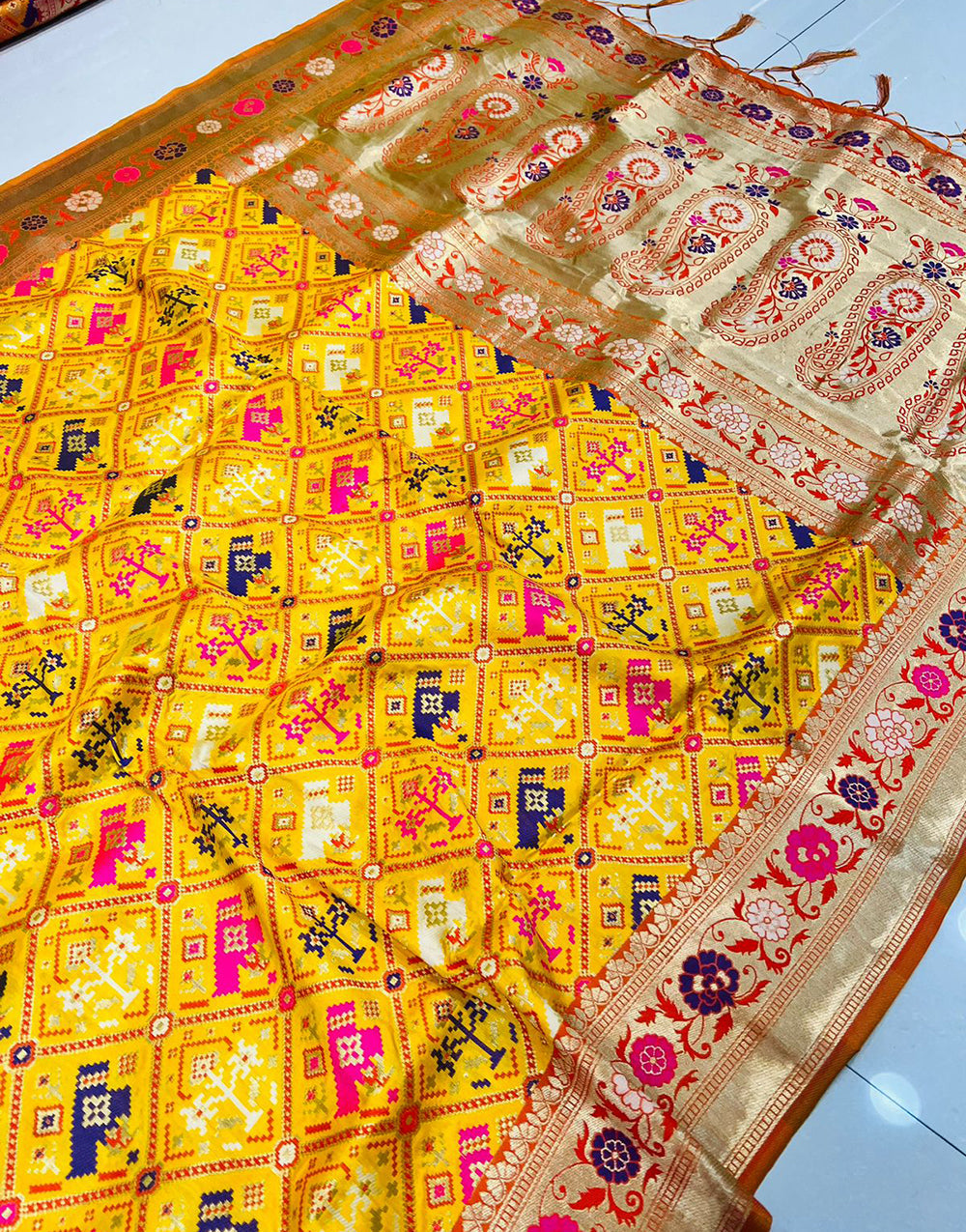 Yellow Soft Patola Silk Saree With Zari Weaving Work