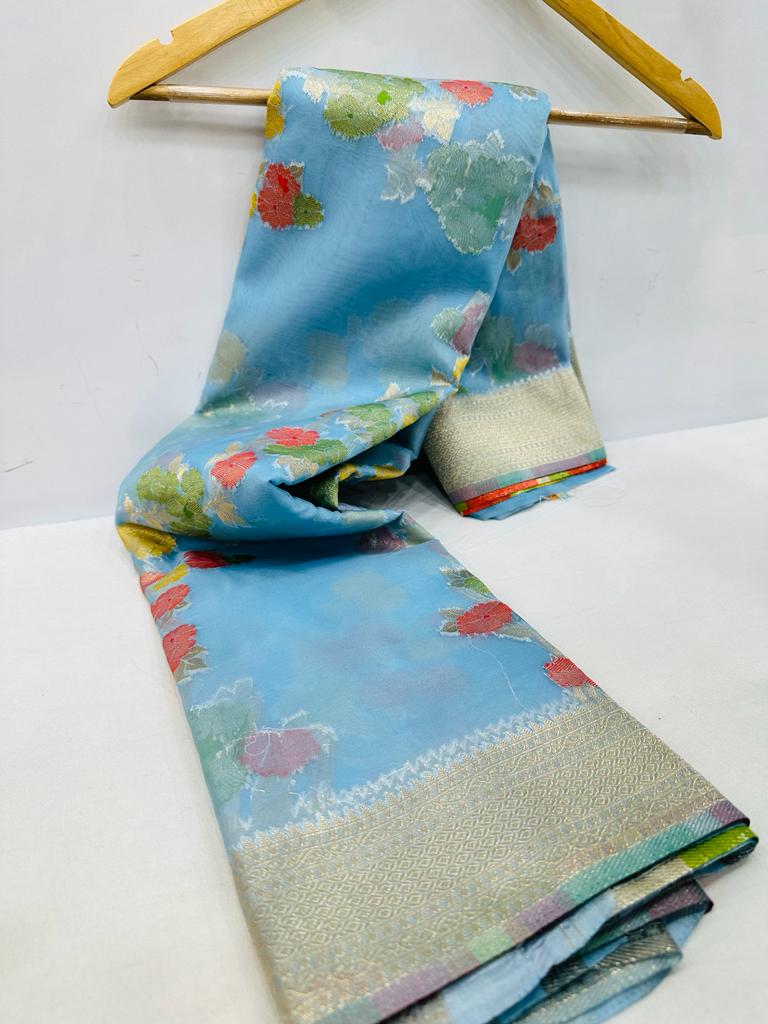 Appealing Sky Organza Silk Saree with Adorning Blouse Piece