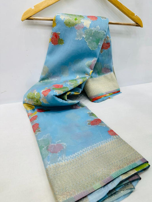 Appealing Sky Organza Silk Saree with Adorning Blouse Piece