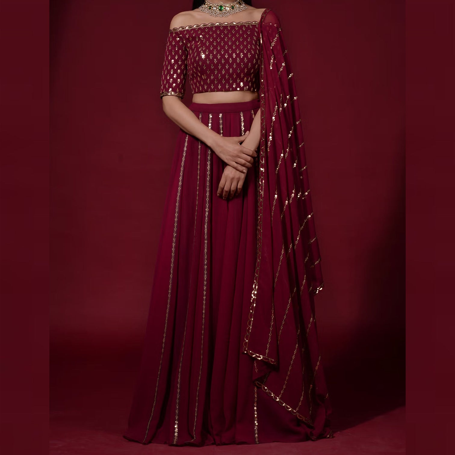 Maroon Lehenga Choli in Georgette with Heavy Sequins and Zari work