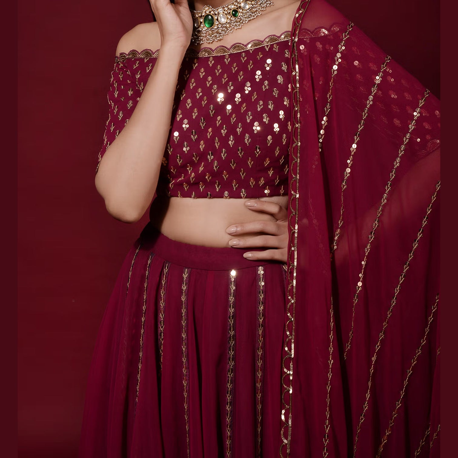 Maroon Lehenga Choli in Georgette with Heavy Sequins and Zari work