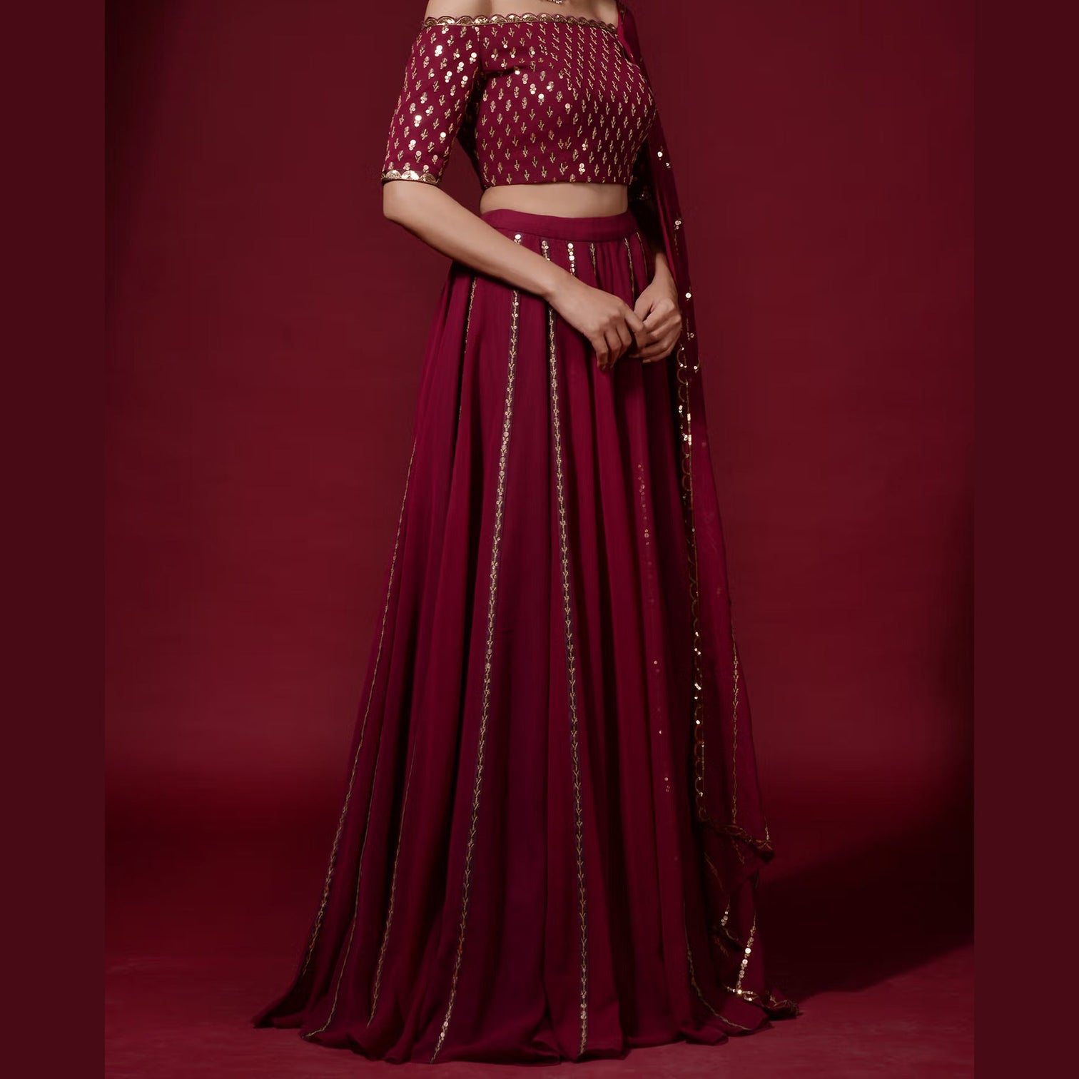 Maroon Lehenga Choli in Georgette with Heavy Sequins and Zari work