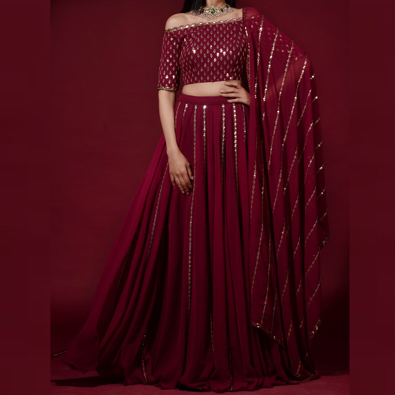 Maroon Lehenga Choli in Georgette with Heavy Sequins and Zari work
