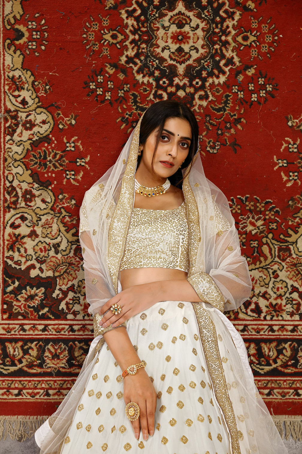 Marvelous White Sequins Embroidered Net Semi Stitched Wedding Lehenga