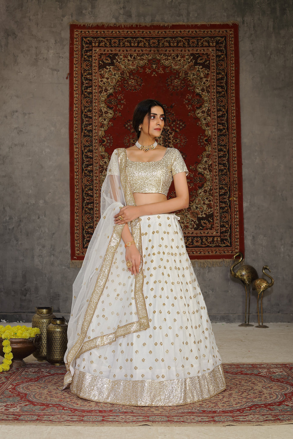 Marvelous White Sequins Embroidered Net Semi Stitched Wedding Lehenga