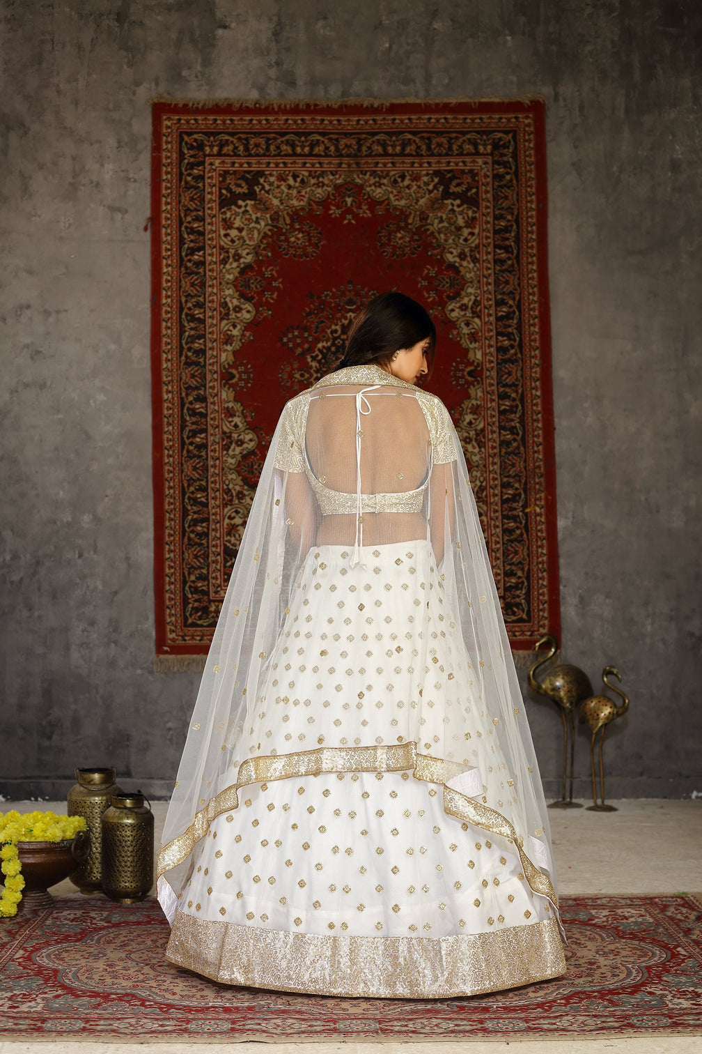 Marvelous White Sequins Embroidered Net Semi Stitched Wedding Lehenga
