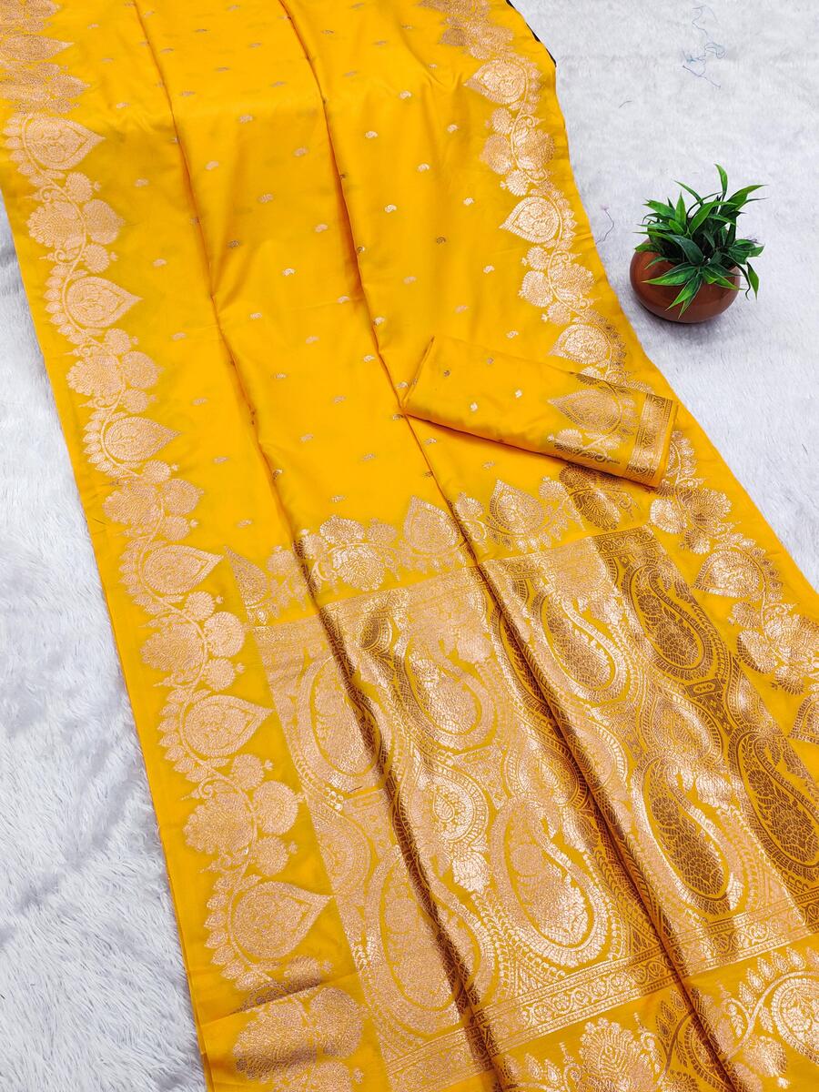 Appealing Yellow Soft Banarasi Silk Saree With Imaginative Blouse Piece