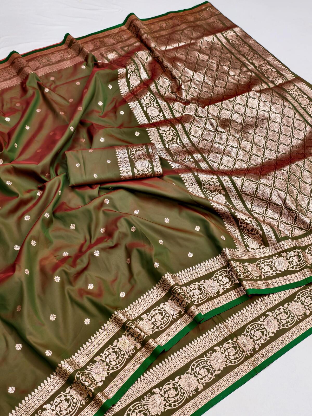 Assemblage Green Pure Zari Weaving Banarasi Silk Saree With Unique Blouse Piece
