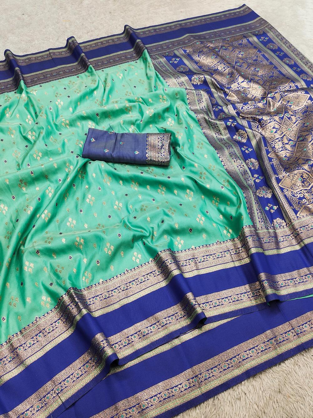 Fugacious Firozi Pure Zari Weaving Banarasi Silk Saree With Nectarous Blouse Piece