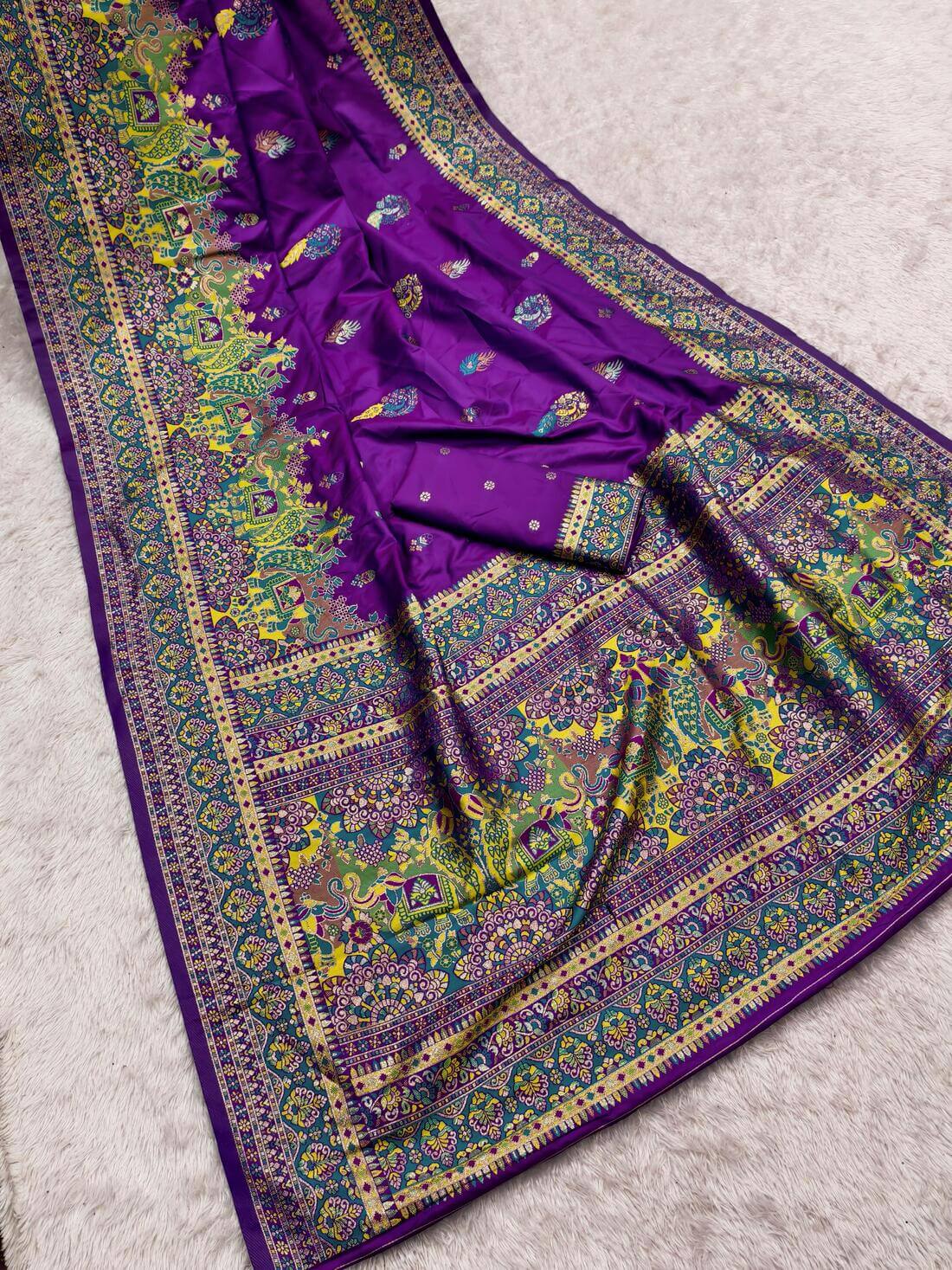 Ethnic Royal Purple Pashmina Silk Saree With Deserving Blouse Piece