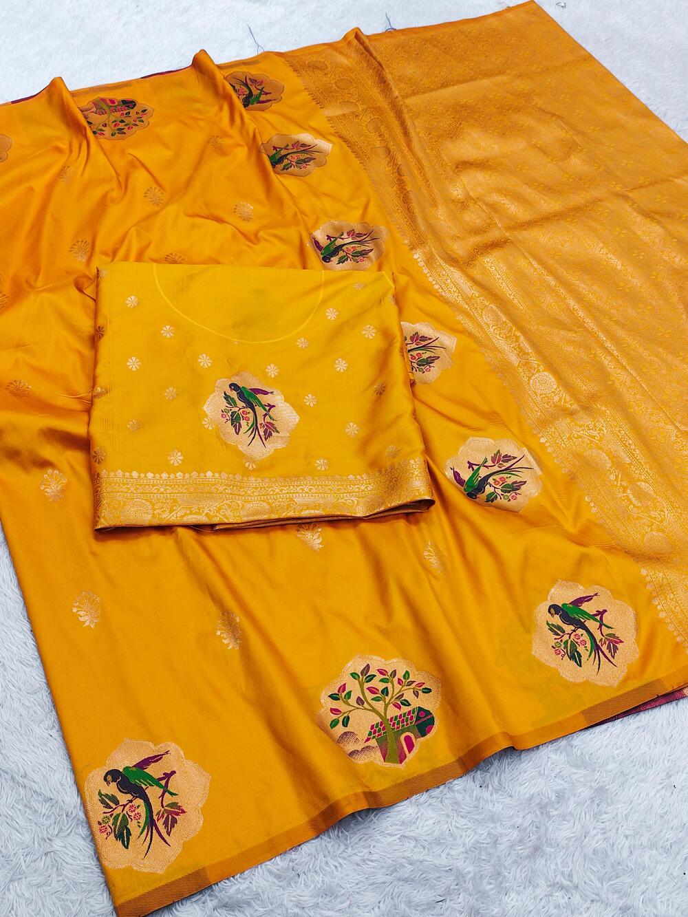 Staggering Yellow Pure Zari Weaving Banarasi Silk Saree With Cynosure Blouse Piece
