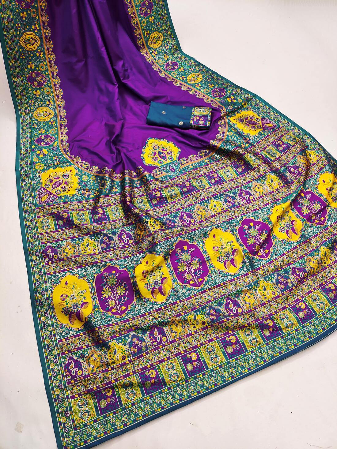 Symmetrical Royal Purple Pashmina Silk Saree With Cynosure Blouse Piece