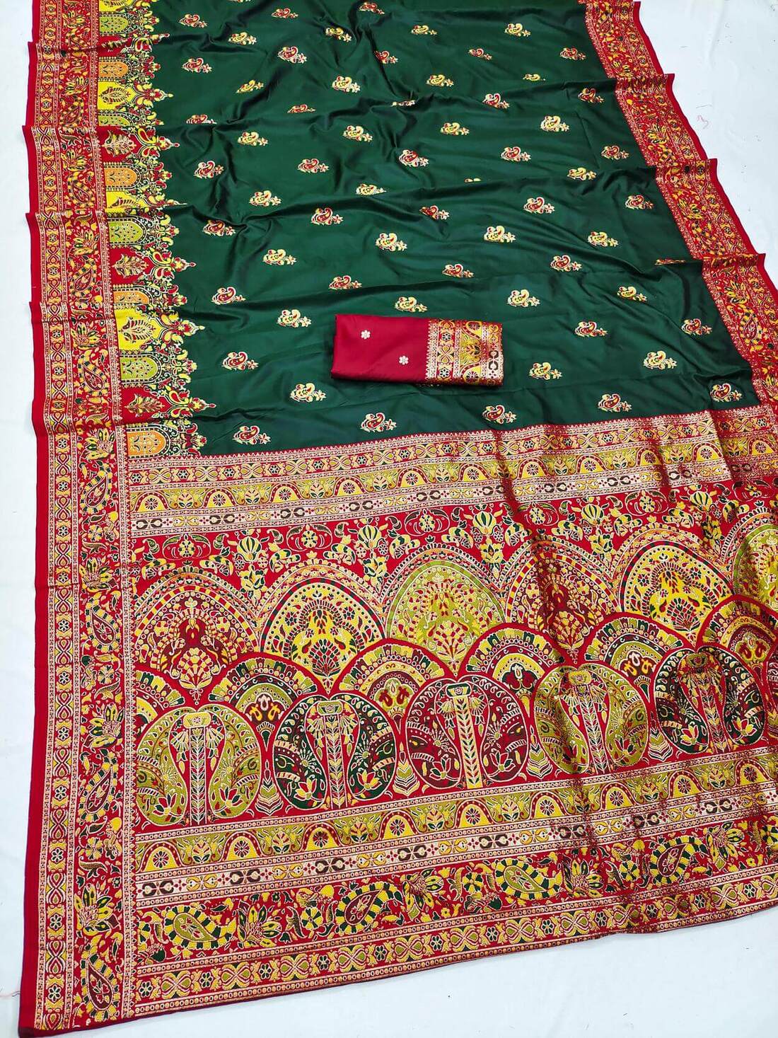 Ideal Dark Green Pashmina Silk Saree With Resplendent Blouse Piece