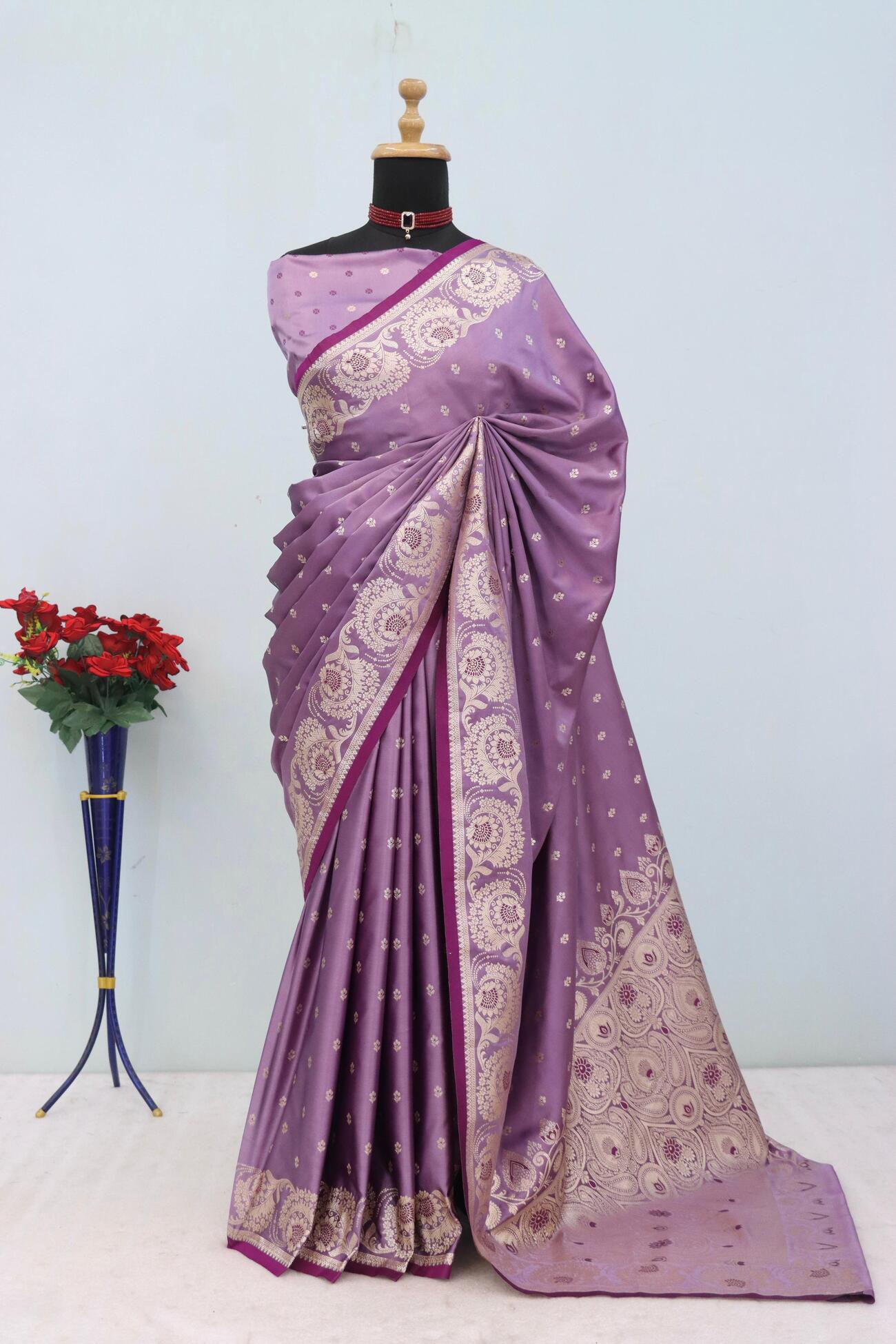 Fugacious Lavender Banarasi Satin Silk Saree With Gorgeous Blouse