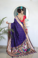 Deserving Navy Blue Paithani Silk Saree With Appealing Blouse Piece