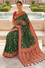 Lustrous Dark Green Pure Zari Weaving Banarasi Silk Saree With Beguiling Blouse Piece