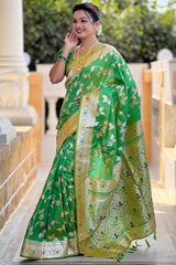 Angelic Mehndi Soft Banarasi Silk Saree With Chatoyant Blouse Piece