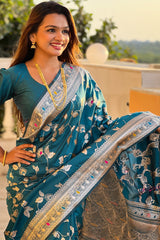 Ineffable Teal Blue Soft Banarasi Silk Saree With Zephyr Blouse Piece