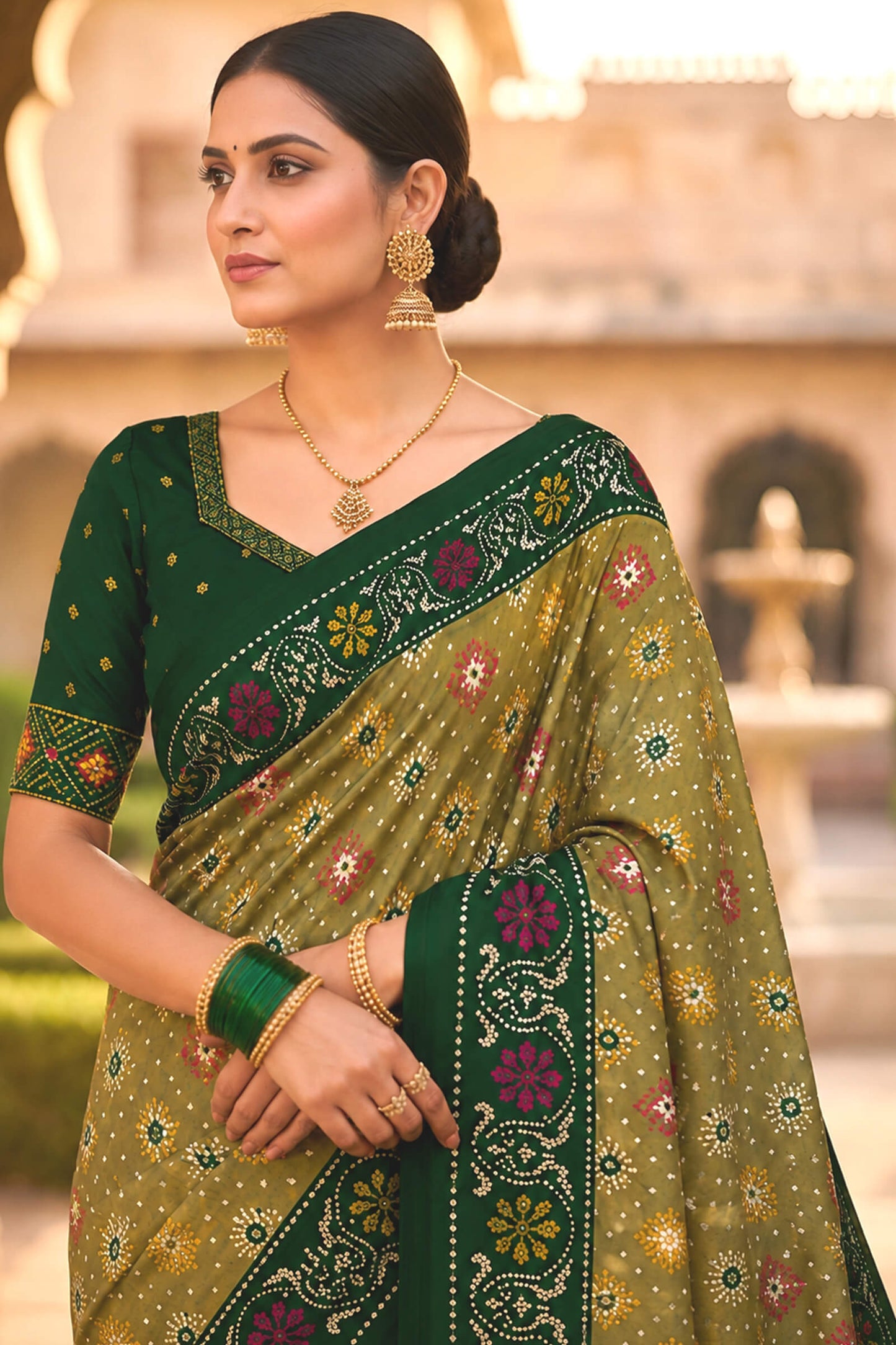 Engaging Green Patola Silk Saree with Smart Blouse Piece