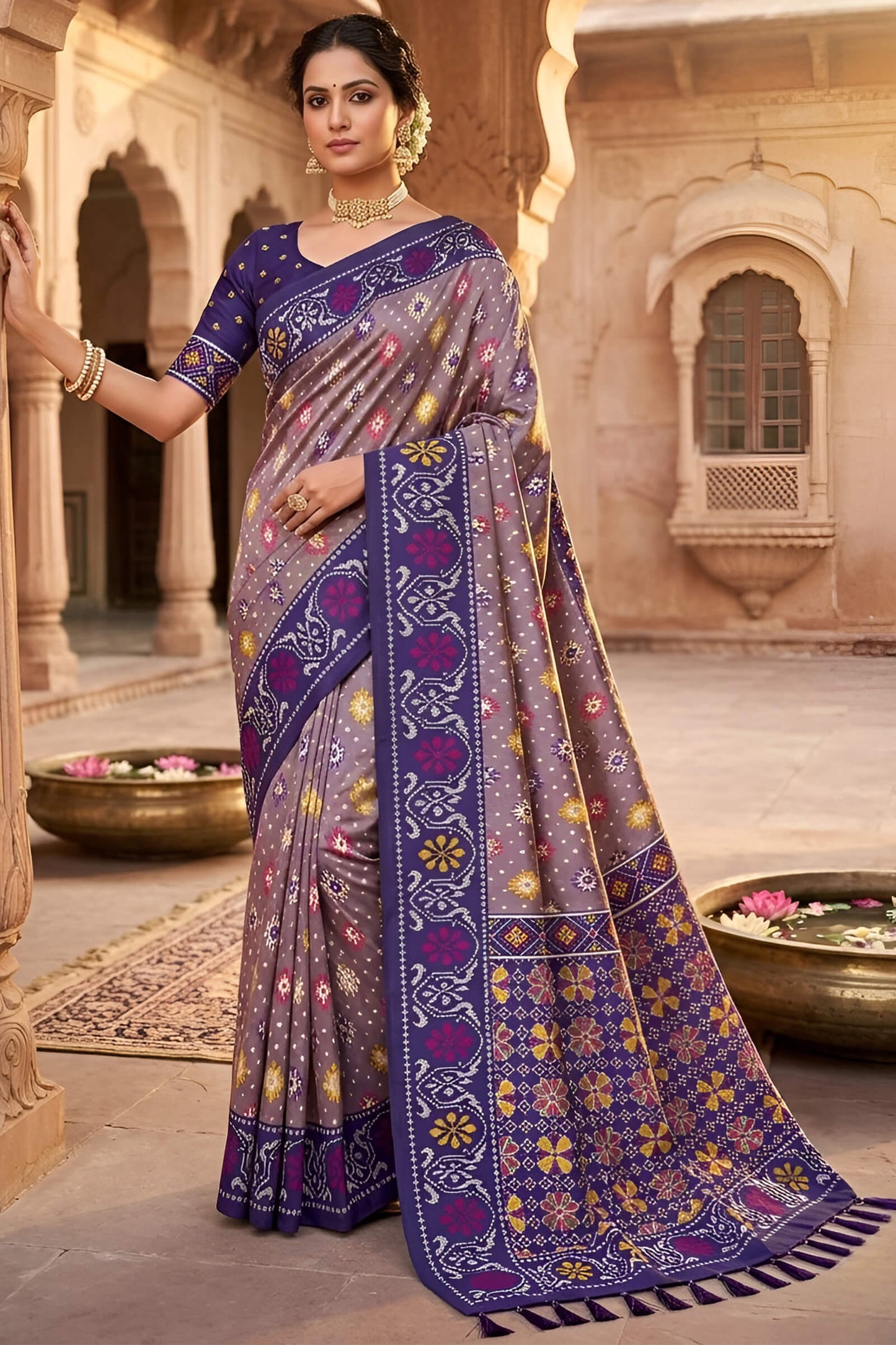 Enthralling Lavender Patola Silk Saree with Embellished Blouse Piece