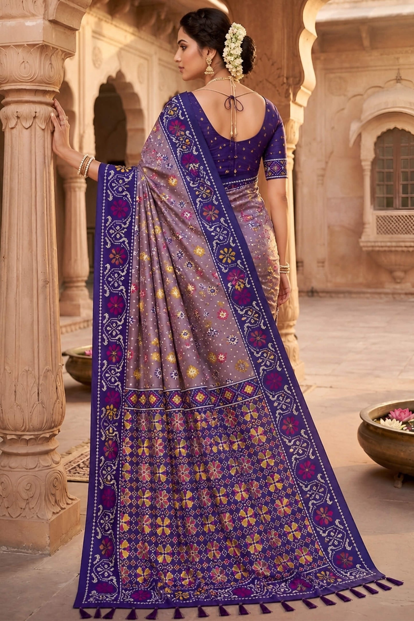 Enthralling Lavender Patola Silk Saree with Embellished Blouse Piece