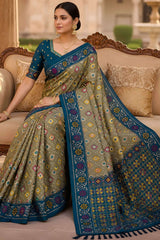 Comely Mehndi Patola Silk Saree with Tremendous Blouse Piece